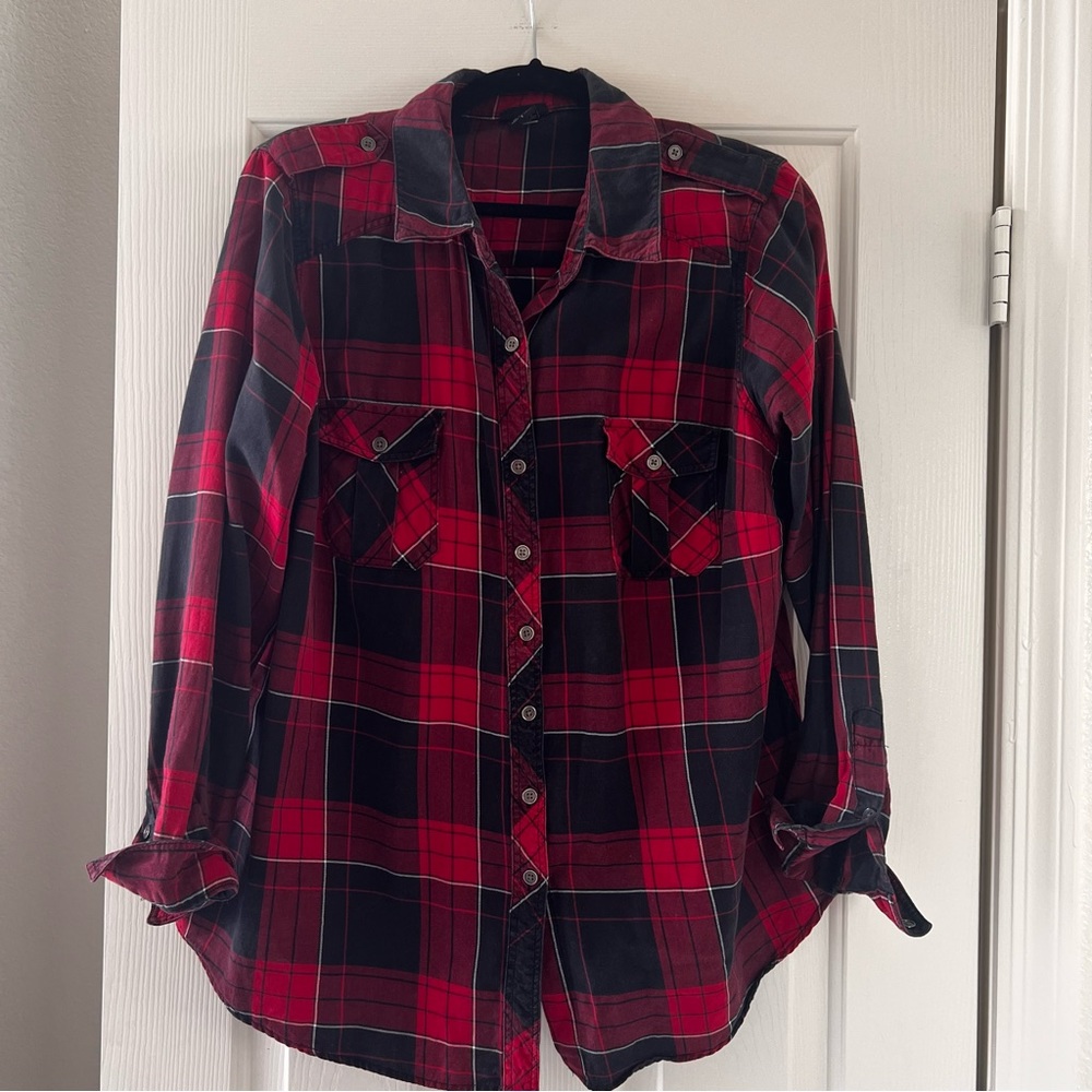 Torrid red and black flannel button down top. Gently worn. Great condition.